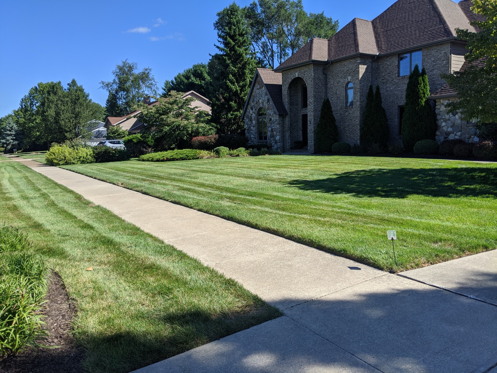 Perfectly striped estate lawn — Hazen Lawn Care, Southwest Michigan